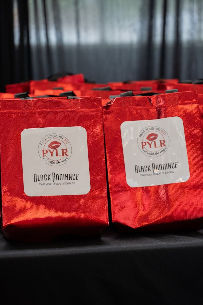 Beauty bag displays at Paint Your Lips Red Event